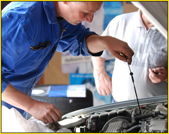 Mechanic Checking Oil in Ocoee, FL